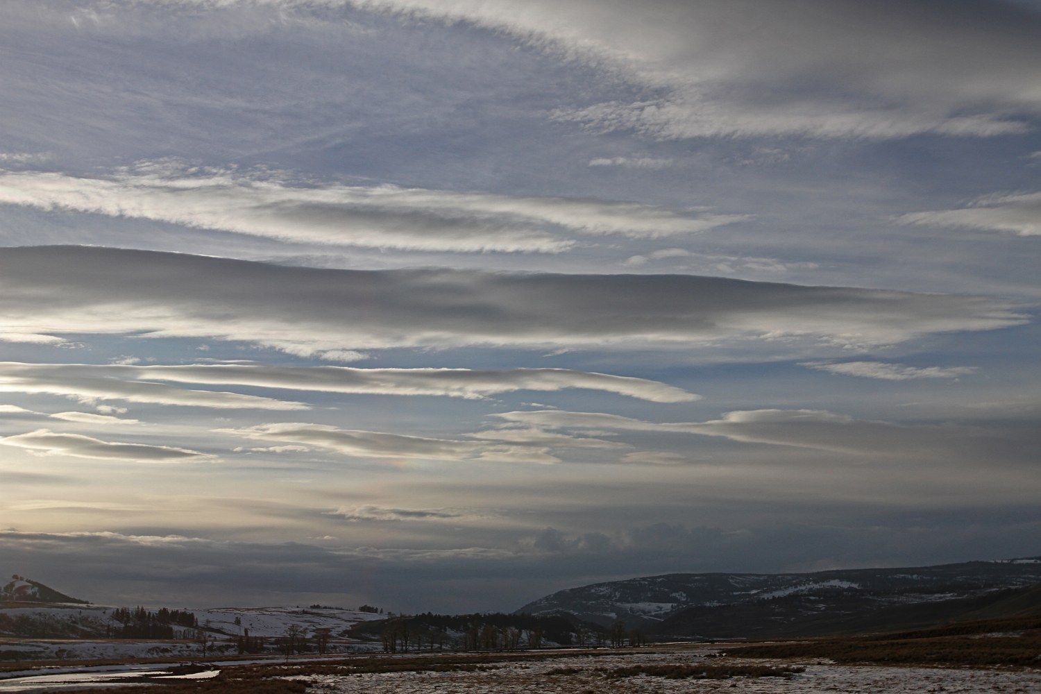 Sunset over the Lamar Valley with the hills going gold.